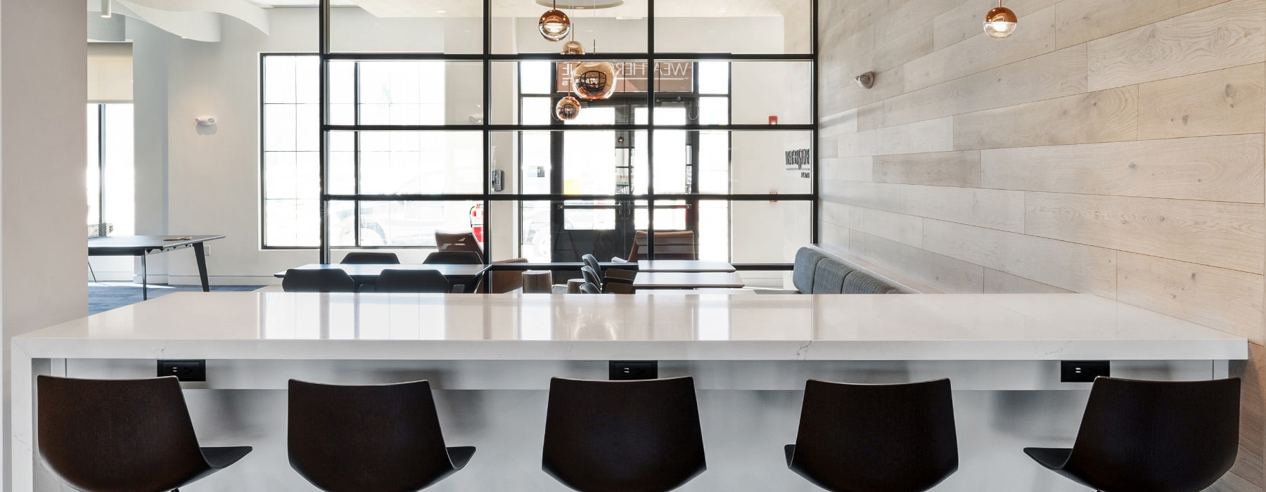 Workspace with multiple areas for seating natural lighting